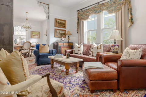 a living room with furniture or couch and a window