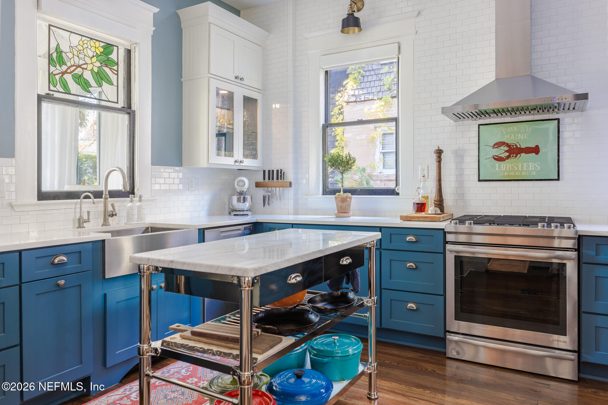 2326 Forbes Street Jacksonville, FL 32204 - Photo 20 of 55 a kitchen with a stove a sink and a window