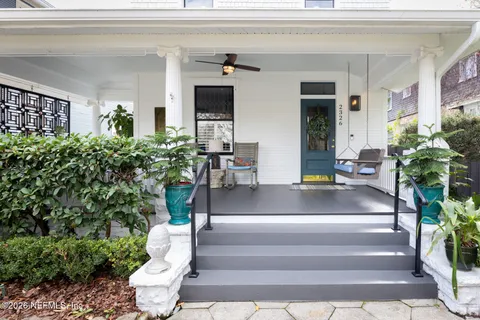 a view of lobby with furniture and potted plant