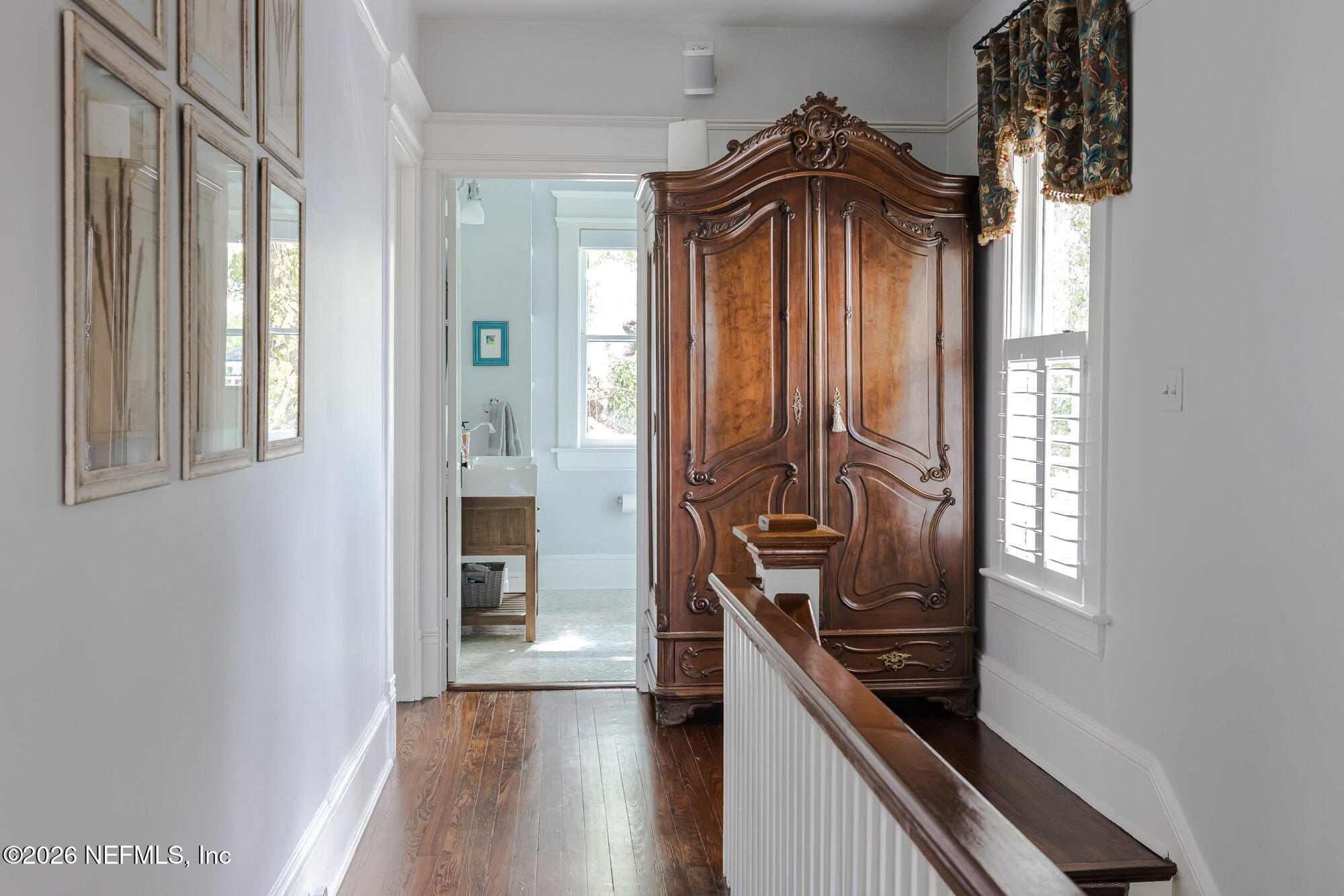 2326 Forbes Street Jacksonville, FL 32204 - Photo 31 of 55 a view of a hallway with wooden floor and staircase