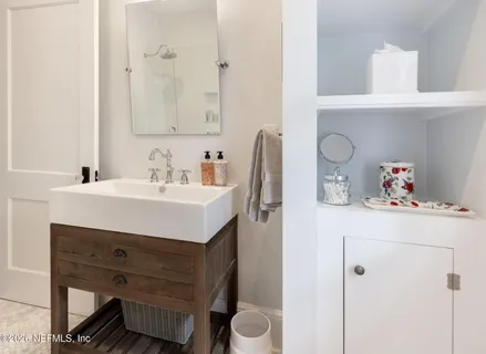 a view of backyard with outdoor and green space