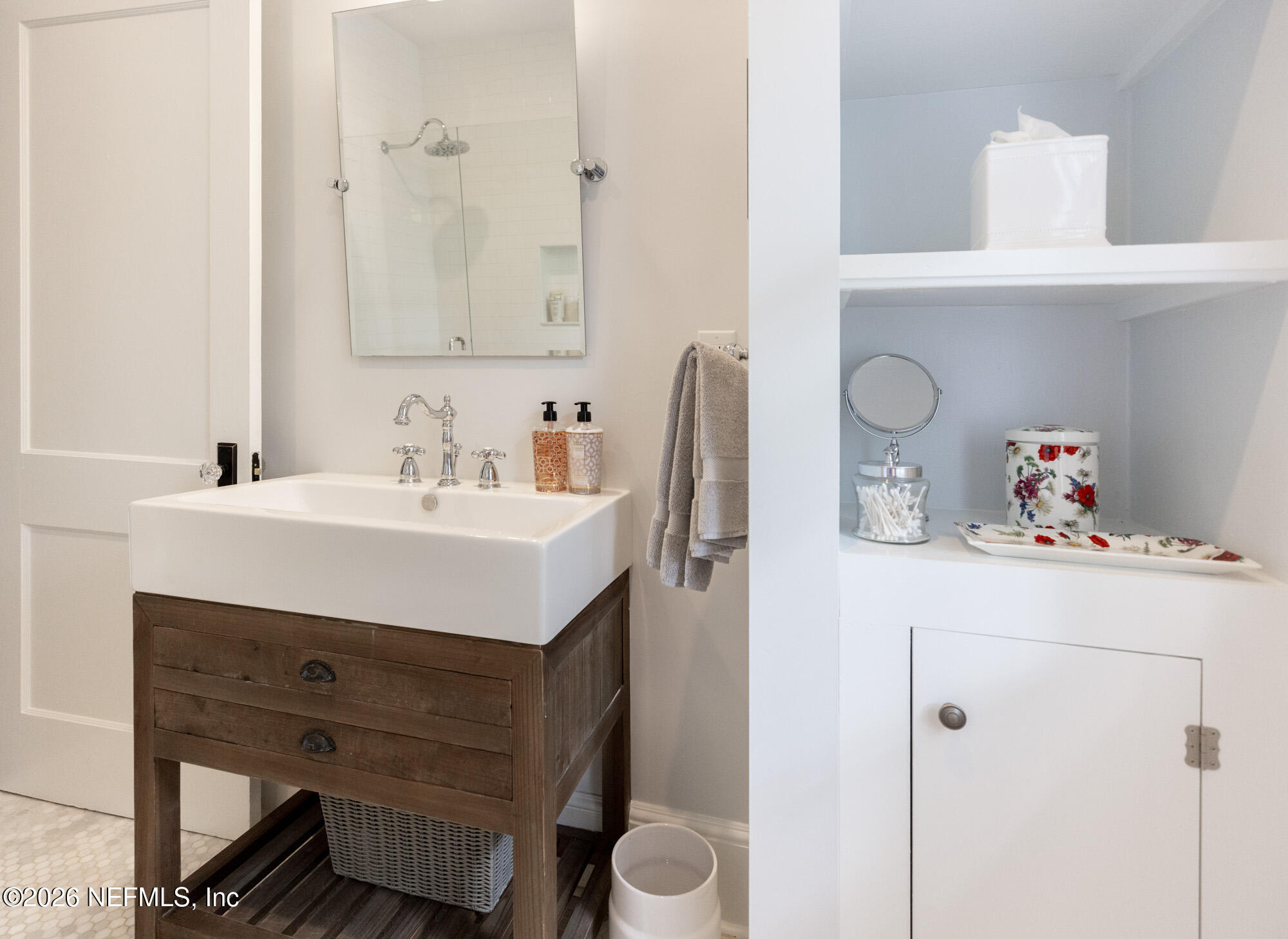 2326 Forbes Street Jacksonville, FL 32204 - Photo 43 of 55 a bathroom with a sink and a mirror