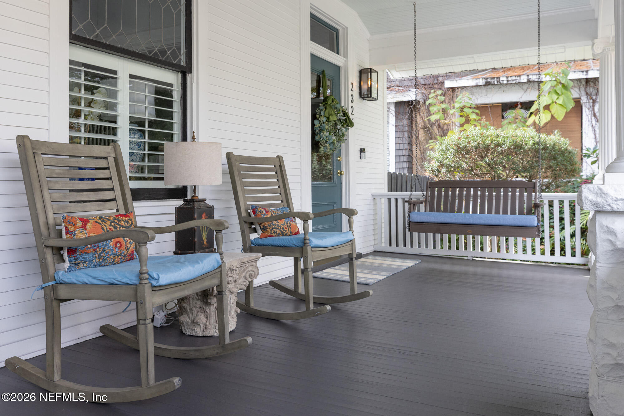 2326 Forbes Street Jacksonville, FL 32204 - Photo 6 of 55 a dining room with furniture a chandelier and wooden floor