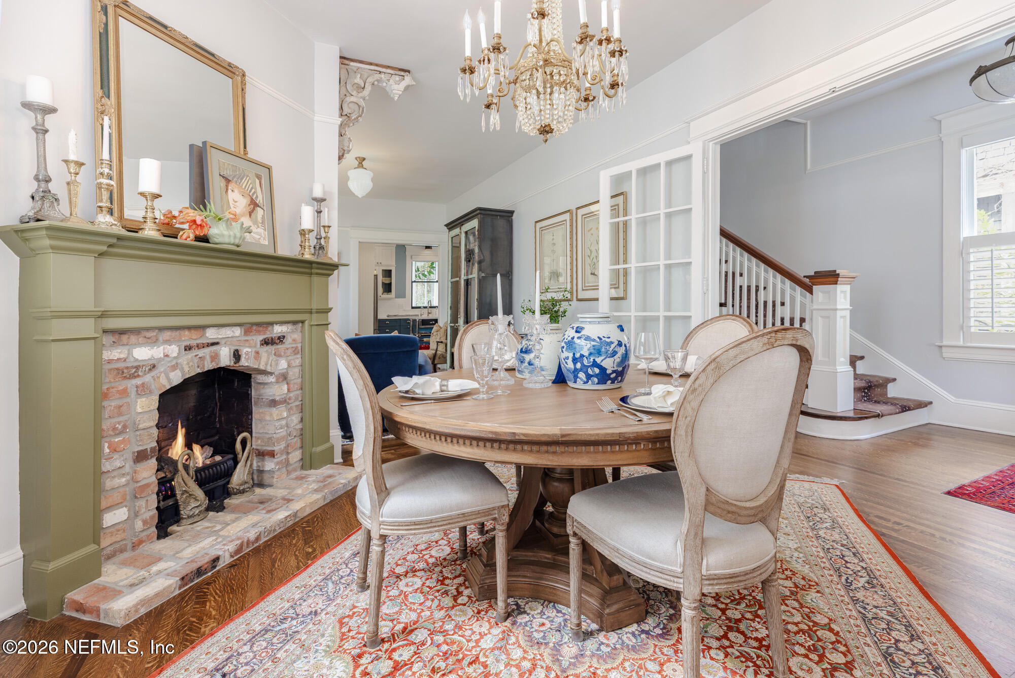 2326 Forbes Street Jacksonville, FL 32204 - Photo 10 of 55 a view of a dining room with furniture a chandelier and wooden floor