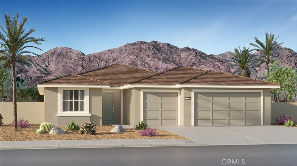 a front view of a house with a garage