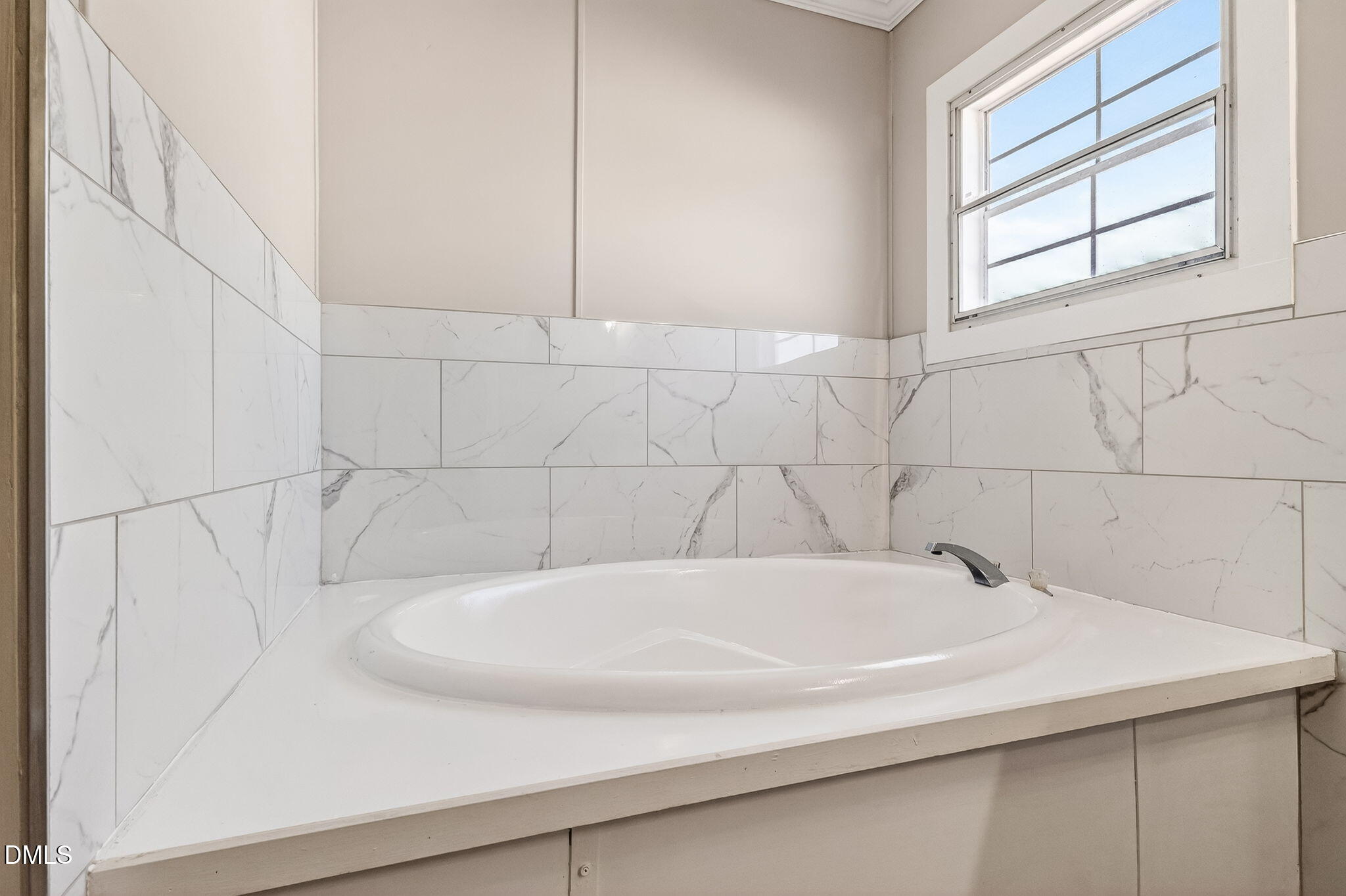 10015 Smith Road Middlesex, NC 27557 - Photo 29 of 48 a bathroom with a bathtub