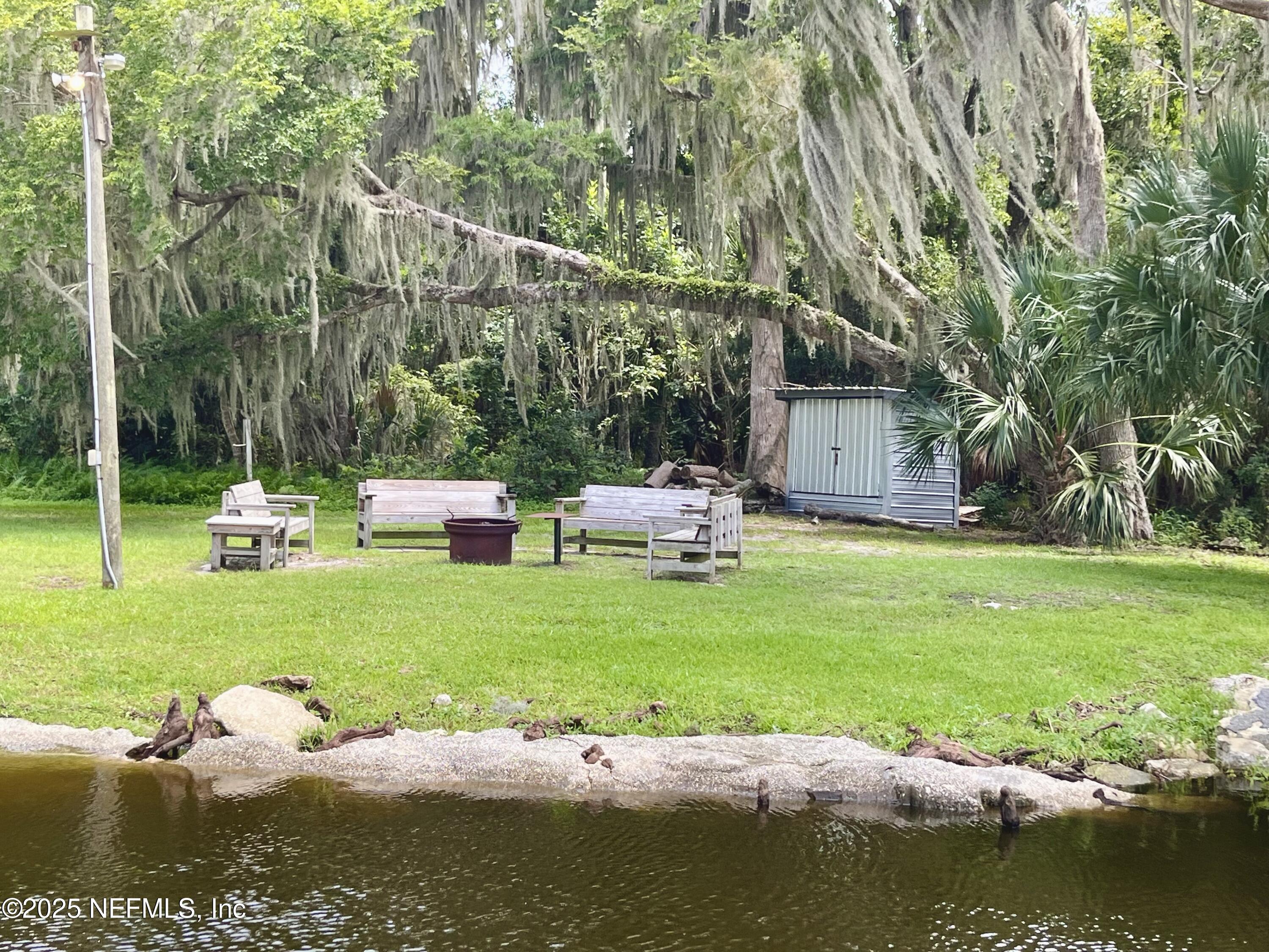 118 July Avenue Georgetown, FL 32139 - Photo 19 of 21 a garden view with a lake view