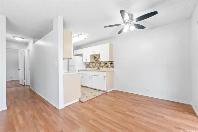 a kitchen with a refrigerator a sink and dishwasher