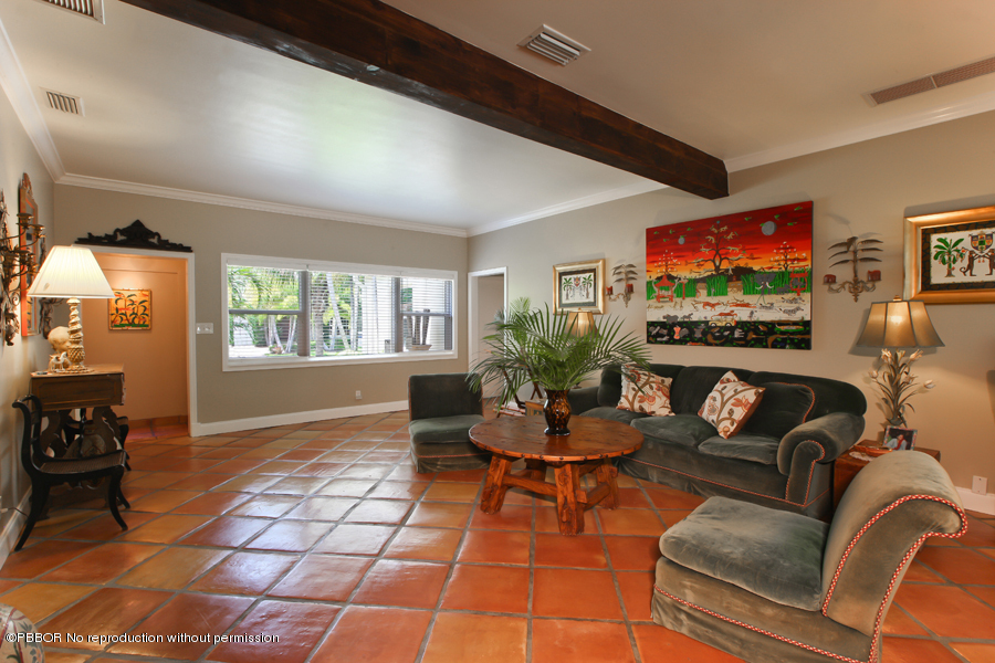 130 Alpine Road West Palm Beach, FL 33405 - Photo 2 of 14 a living room with furniture a rug and a flat screen tv