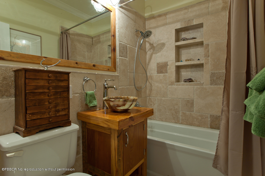130 Alpine Road West Palm Beach, FL 33405 - Photo 11 of 14 a bathroom with a sink a toilet and shower