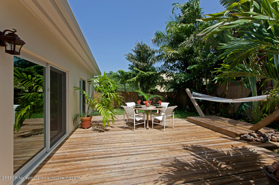 130 Alpine Road West Palm Beach, FL 33405 - Photo 13 of 14 a view of a outdoor space with furniture
