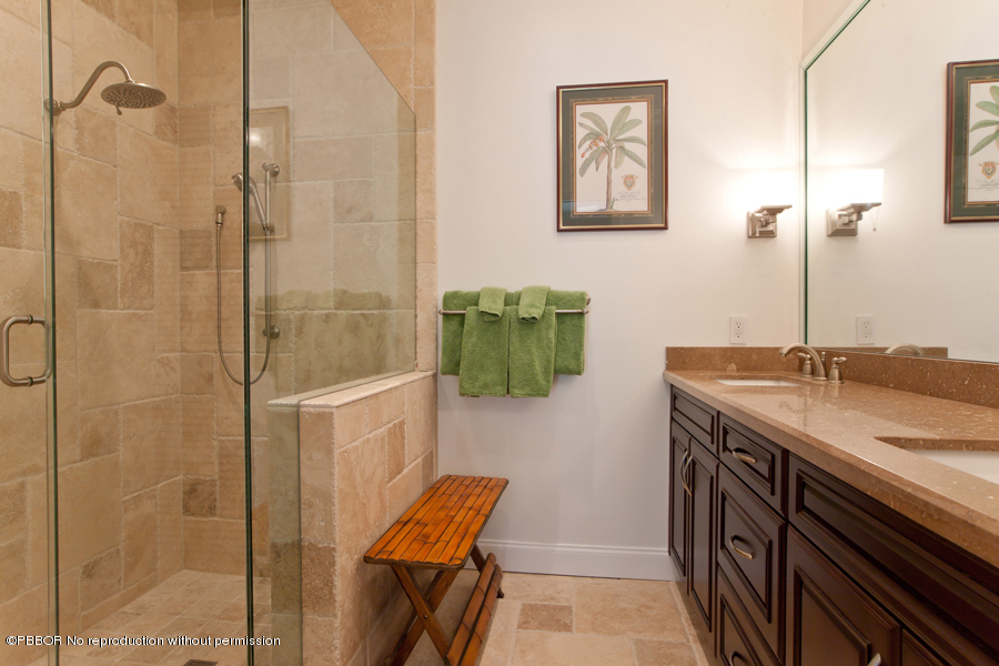 130 Alpine Road West Palm Beach, FL 33405 - Photo 7 of 14 a bathroom with a granite countertop sink a toilet and shower