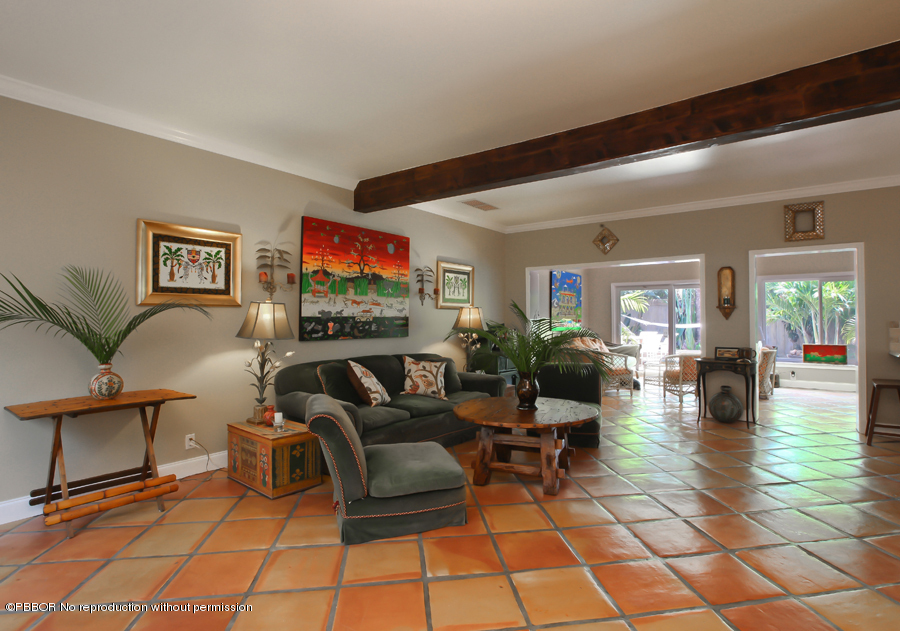 130 Alpine Road West Palm Beach, FL 33405 - Photo 10 of 14 a living room with fireplace furniture and dining table