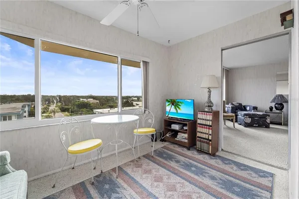 a bedroom with a bed and furniture