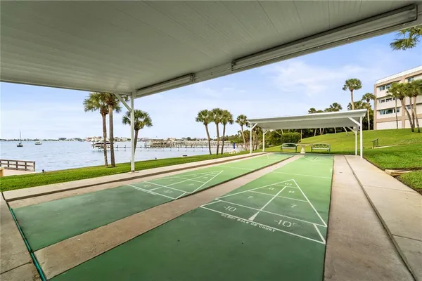 a picture of a book and white wooden floor