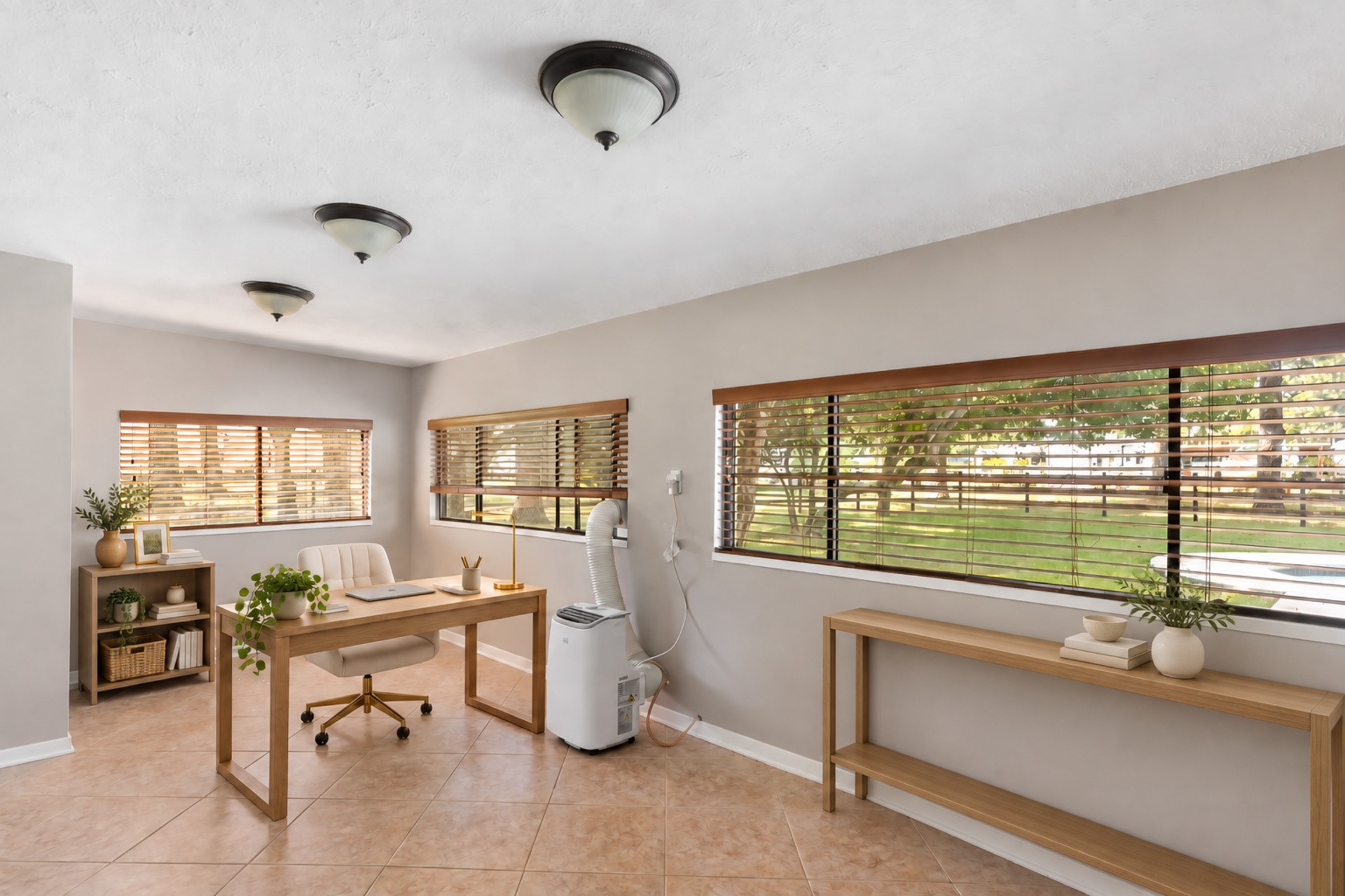 1300 Smith Road Huffman, TX 77336 - Photo 28 of 50 Versatile room ideal for an office or sunroom -Virtually staged photo