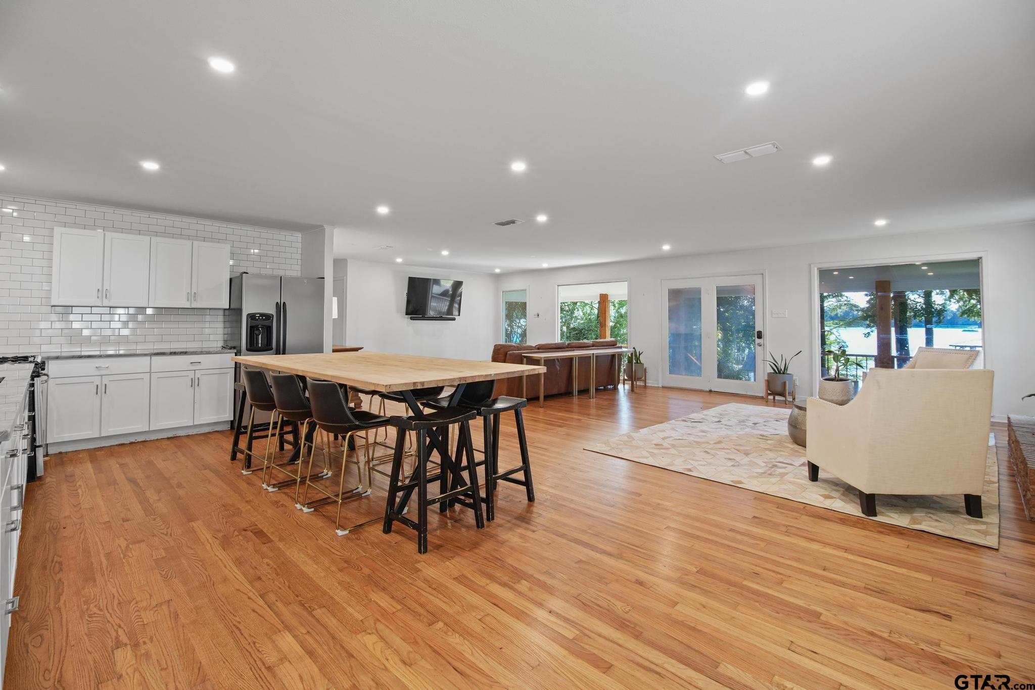 18392 Eastside Road Troup, TX 75789 - Photo 4 of 19 a large kitchen with a table and chairs in it