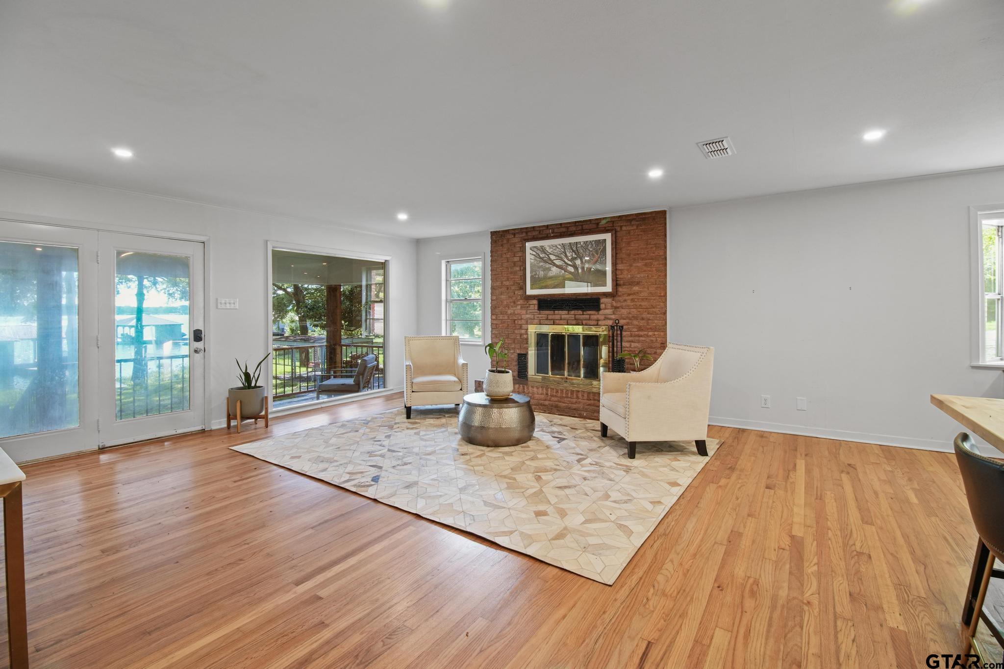 18392 Eastside Road Troup, TX 75789 - Photo 8 of 19 a living room with furniture and wooden floor