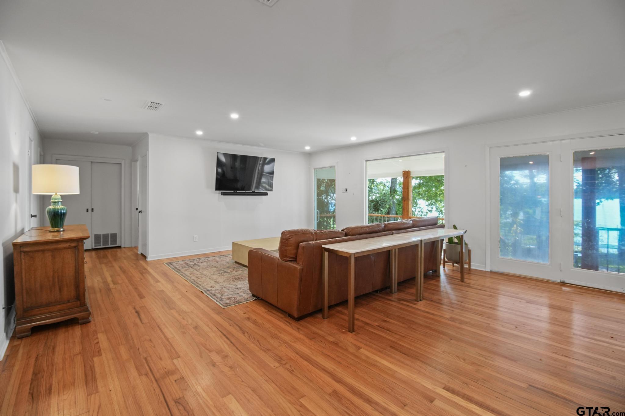 18392 Eastside Road Troup, TX 75789 - Photo 10 of 19 a living room with furniture and a flat screen tv