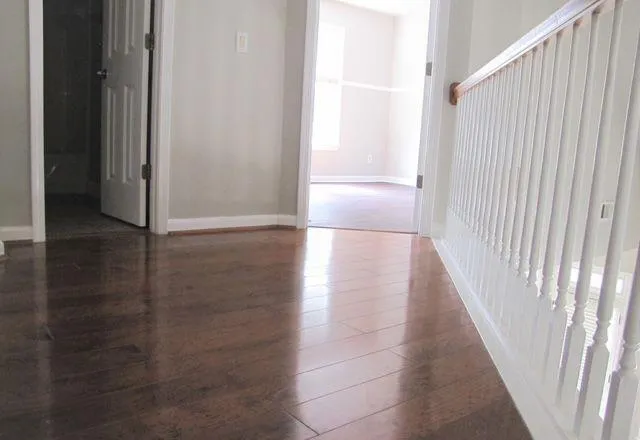 a view of gallery with wooden floor