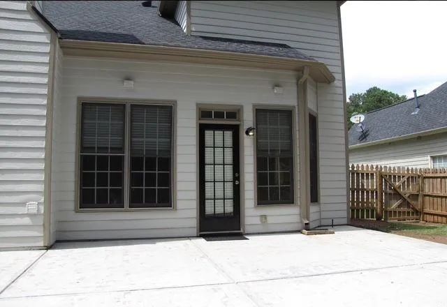 a house view with a garden space