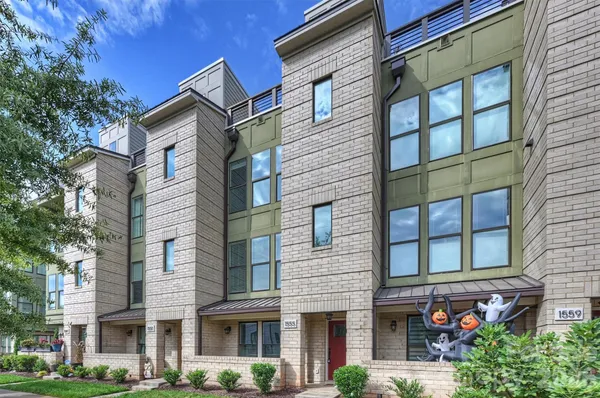 a front view of a multi story residential apartment building