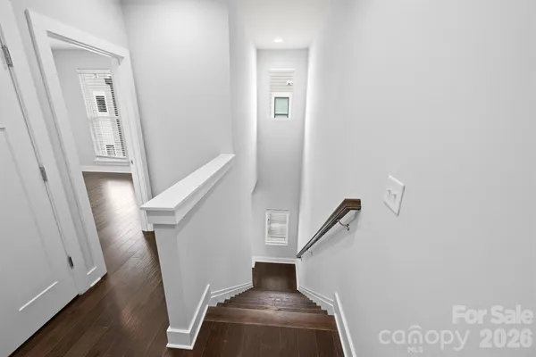 a view of entryway with wooden floor
