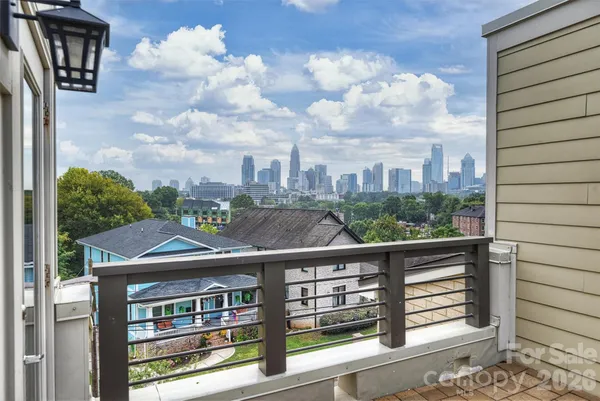 a view of a city from a balcony