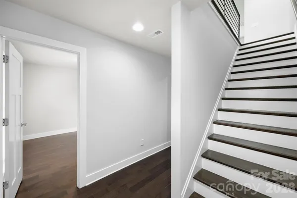 a view of entryway with wooden floor