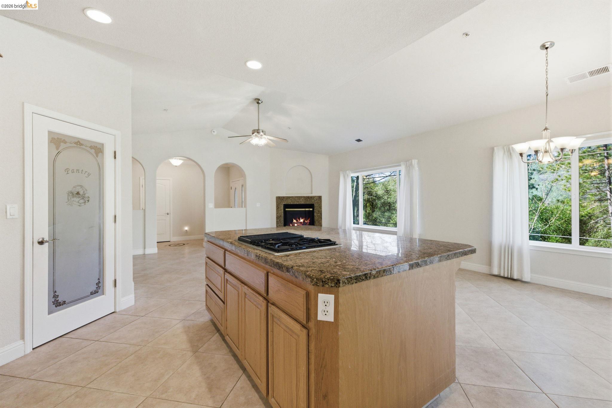 20245 Tuolumne Road North Tuolumne, CA 95379 - Photo 11 of 43 a kitchen with sink stove and refrigerator