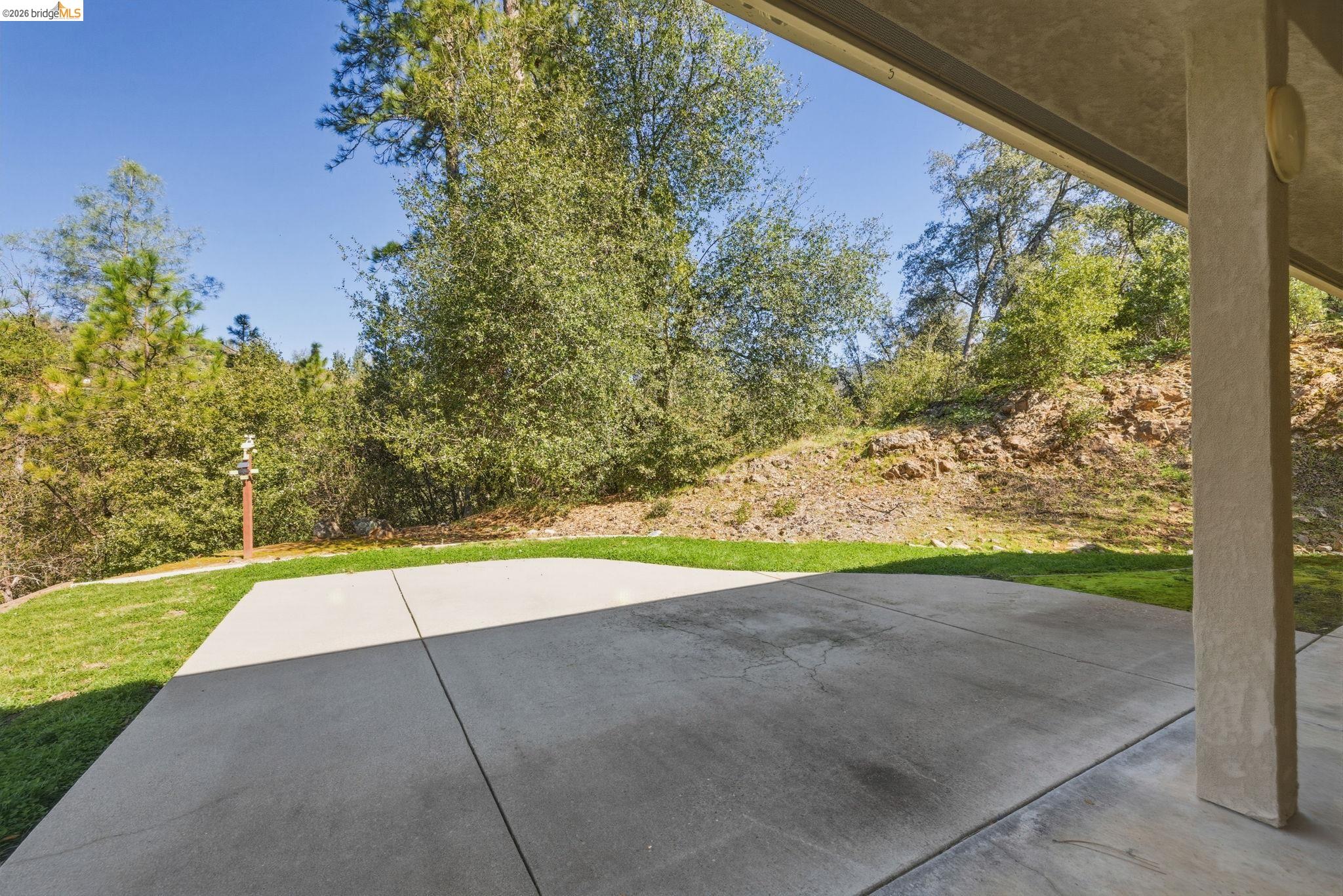 20245 Tuolumne Road North Tuolumne, CA 95379 - Photo 13 of 43 a view of an outdoor space and a yard