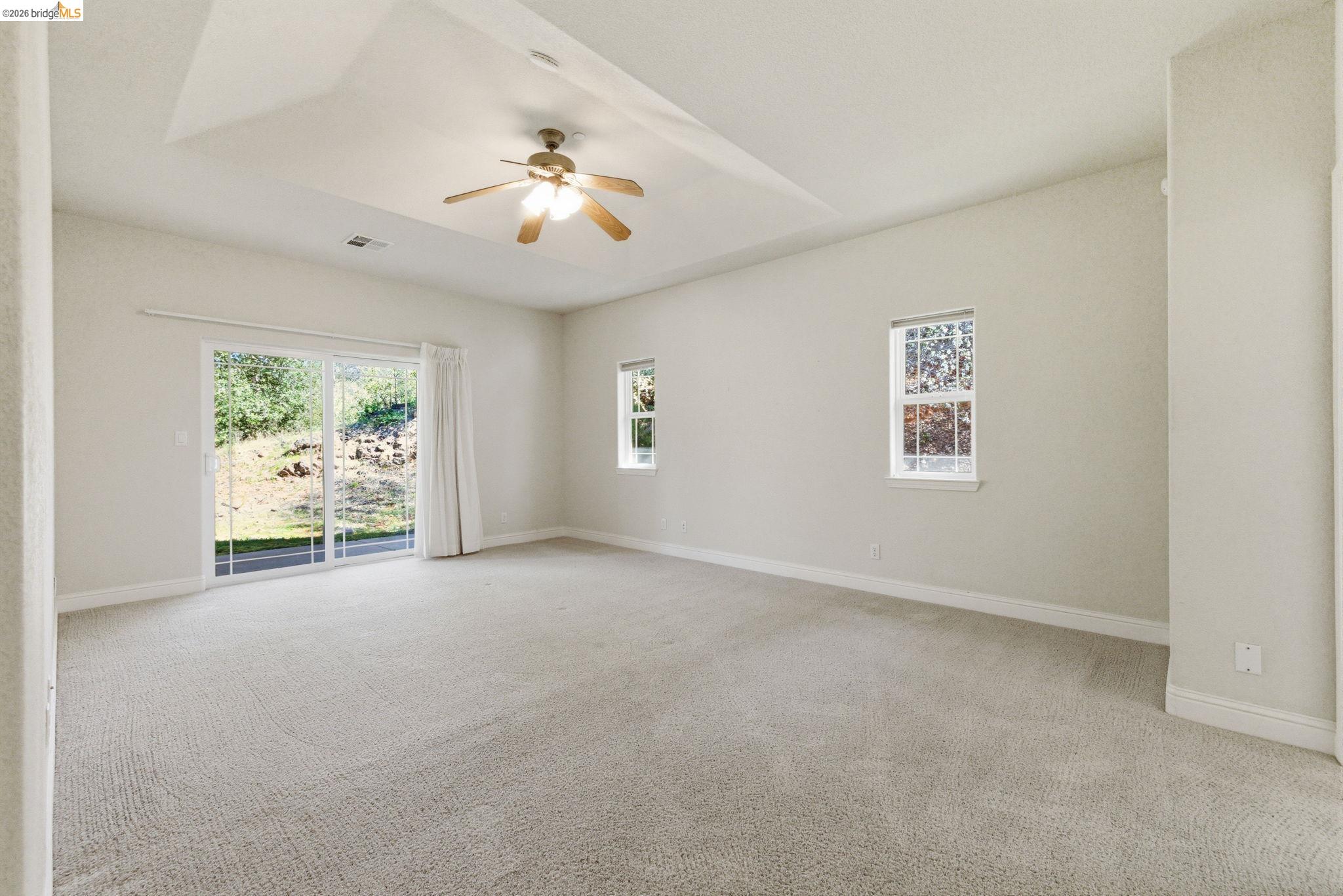 20245 Tuolumne Road North Tuolumne, CA 95379 - Photo 20 of 43 a view of an empty room with a window