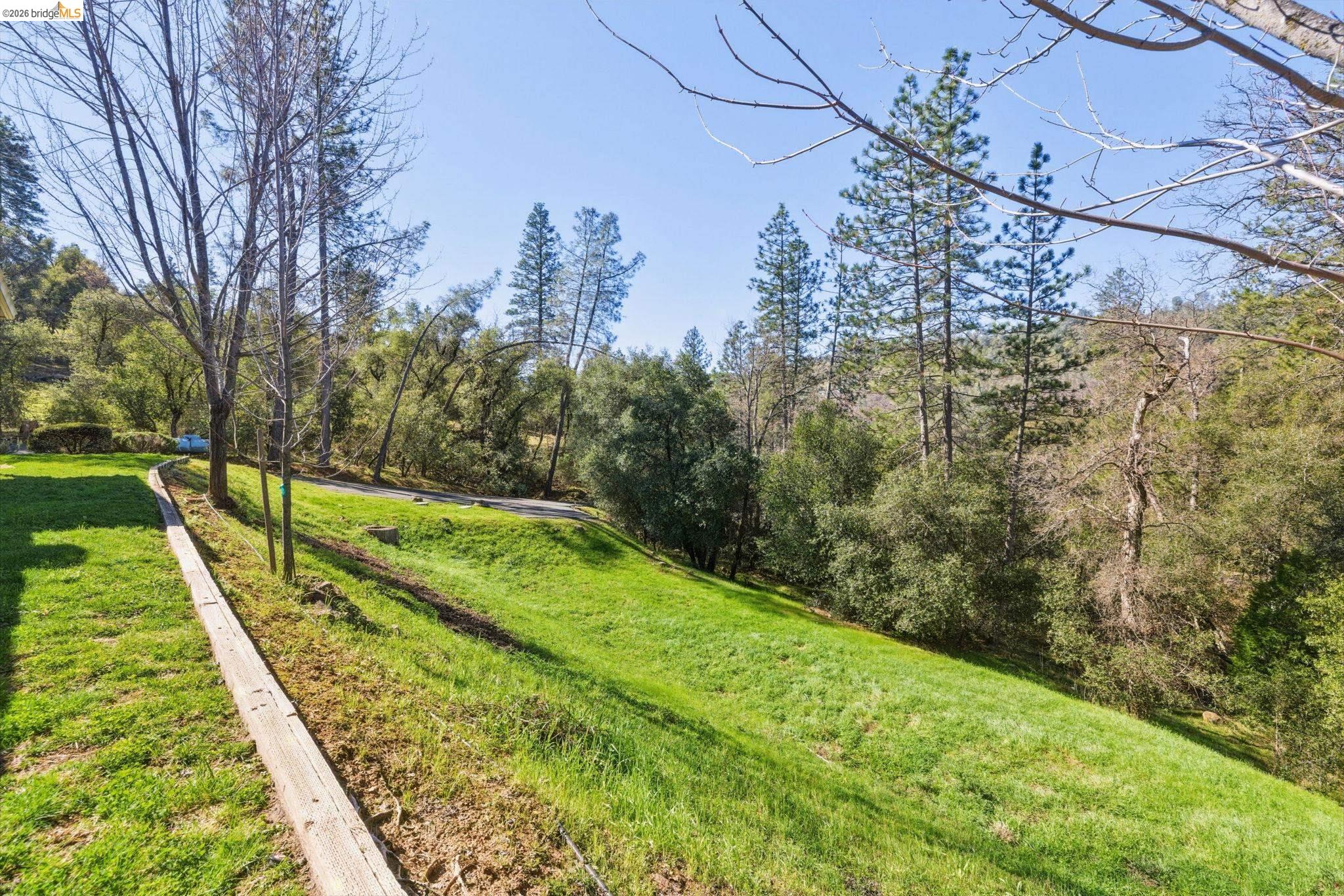 20245 Tuolumne Road North Tuolumne, CA 95379 - Photo 43 of 43 a view of an outdoor space with a lake view
