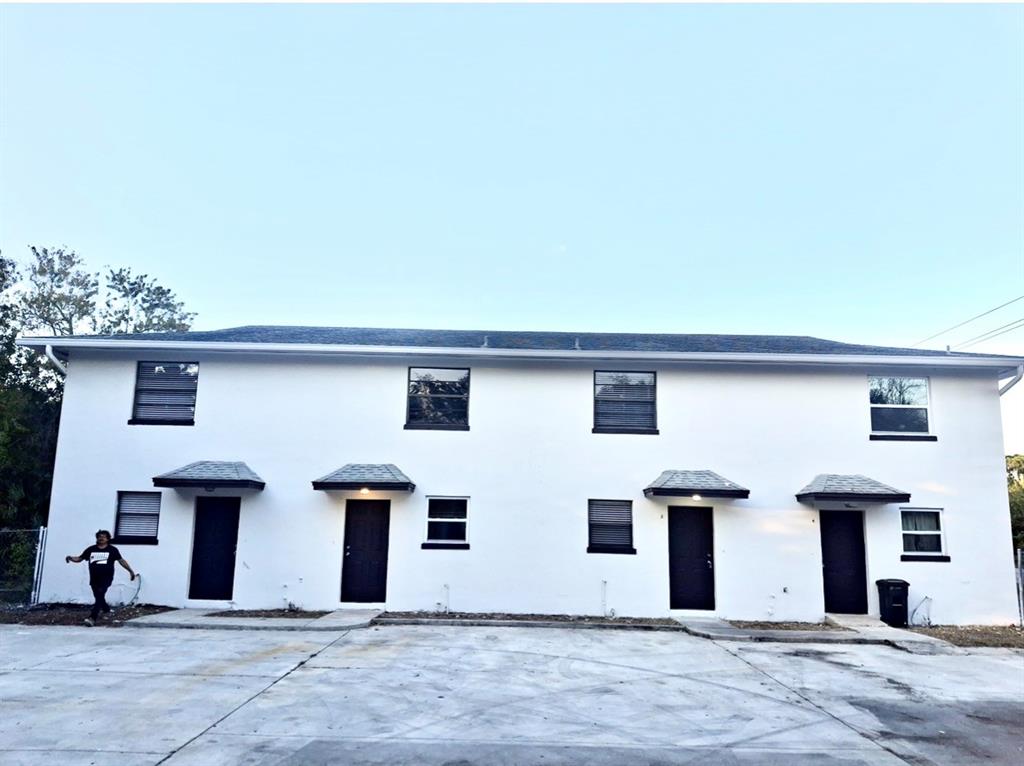 front view of a house with a street