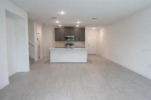 a view of a house with a kitchen