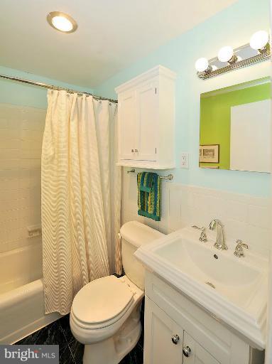 1880 Columbia Road Northwest, Unit 301 Washington, DC 20009 - Photo 13 of 15 Updated Bathroom