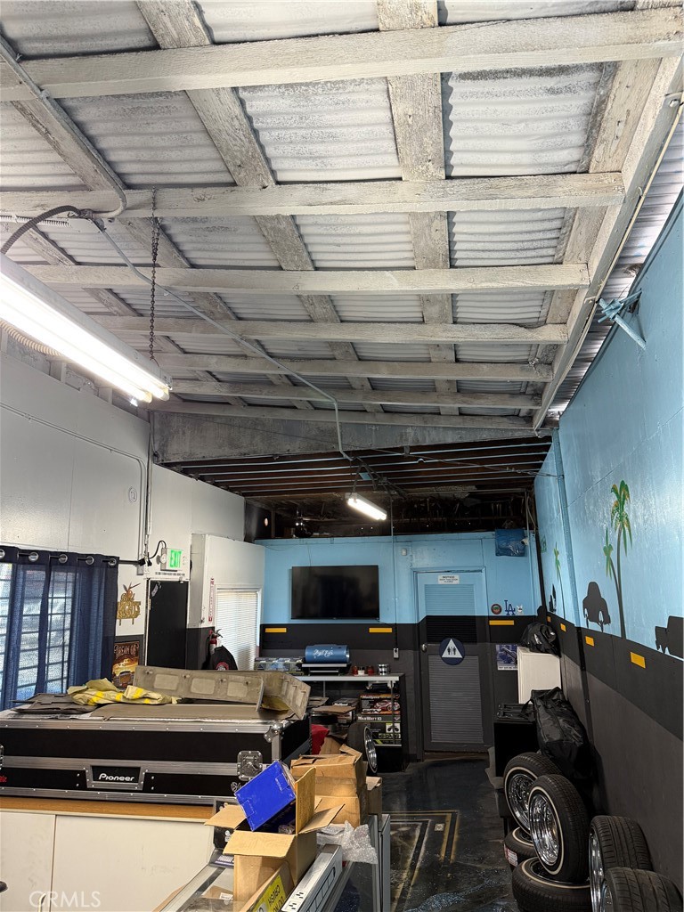 219 1st Santa Ana, CA 92701 - Photo 2 of 12 a room with storage and furniture