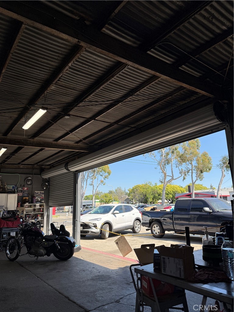 219 1st Santa Ana, CA 92701 - Photo 7 of 12 a view of a patio with lawn chairs and a potted plant