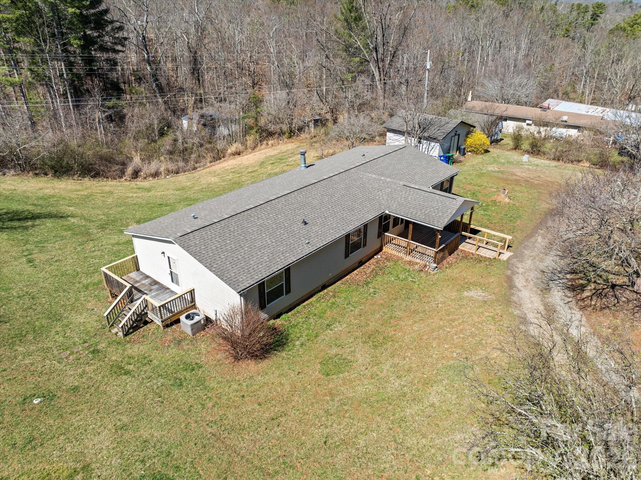 18 Ford Valley Road Weaverville, NC 28787 - Photo 32 of 37 an aerial view of a house with pool and a yard