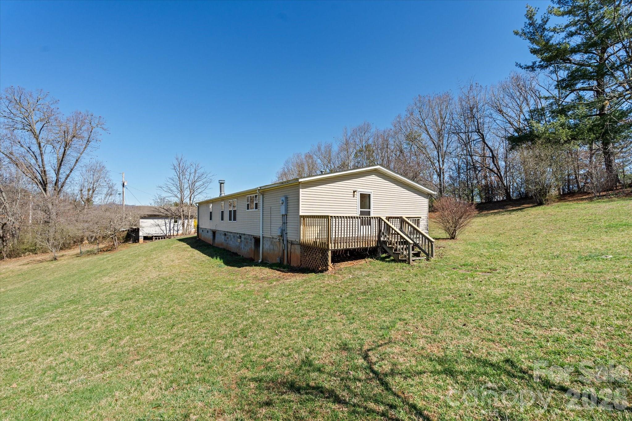 18 Ford Valley Road Weaverville, NC 28787 - Photo 34 of 37 a view of a house with backyard
