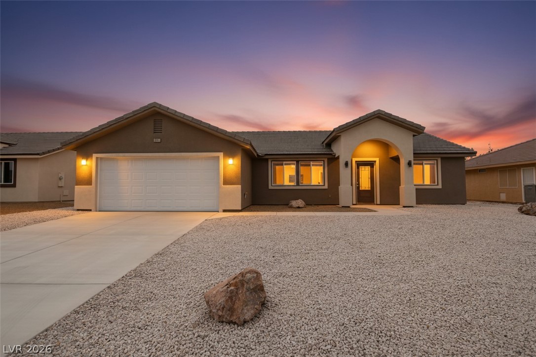 3871 North Mayfield Ranch Road Pahrump, NV 89060 - Photo 1 of 33 Front of the House - Twilight