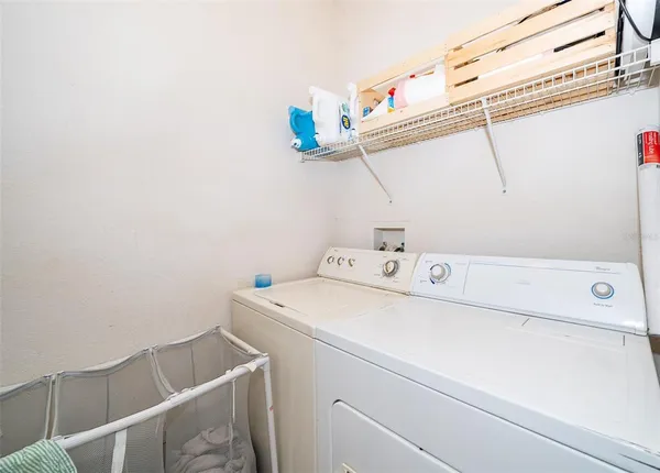 a utility room with dryer and washer