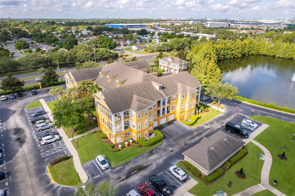 3707 Conroy Road, Unit 1715 Orlando, FL 32839 - Photo 18 of 20 an aerial view of a house with swimming pool and outdoor space
