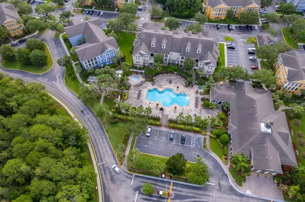 an aerial view of multiple houses with outdoor space