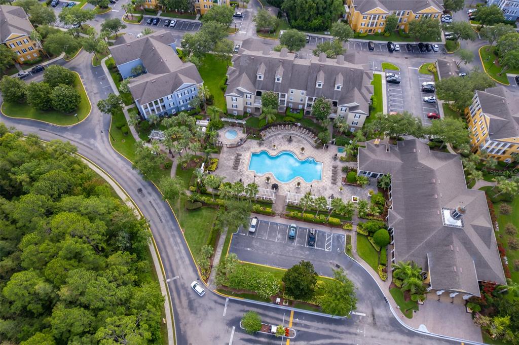 3707 Conroy Road, Unit 1715 Orlando, FL 32839 - Photo 19 of 20 an aerial view of multiple houses with outdoor space