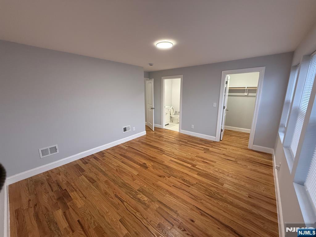 82 South Devine Street Newark, NJ 07106 - Photo 3 of 4 a view of empty room with wooden floor