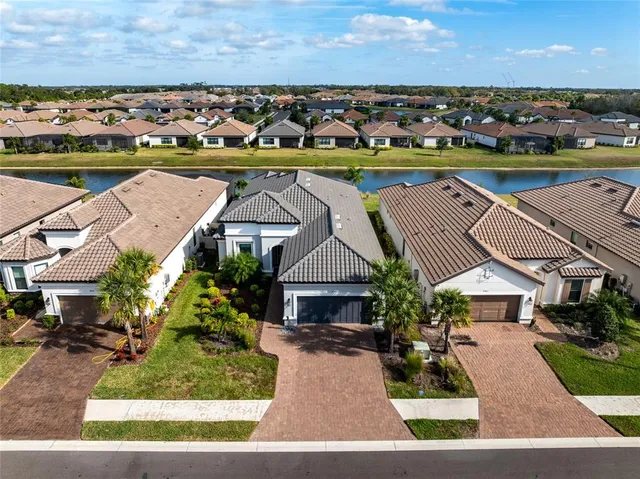 an aerial view of a house with a garden
