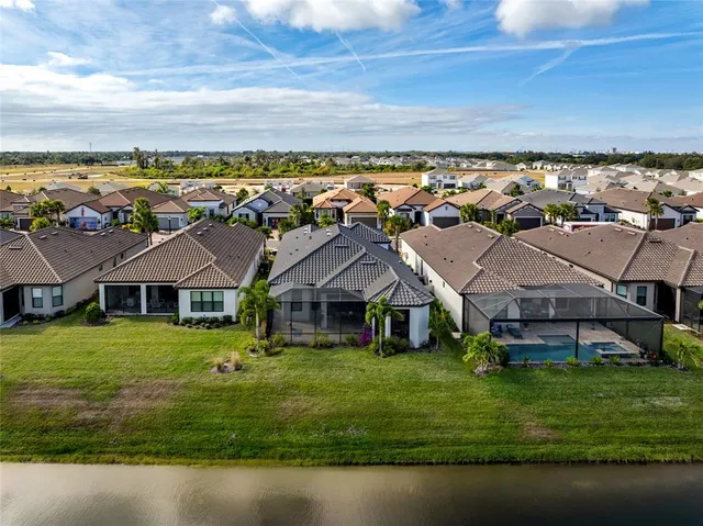 a living room with furniture a rug and a window
