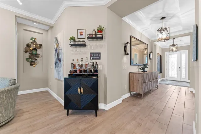 an aerial view of a house with a swimming pool yard and outdoor seating