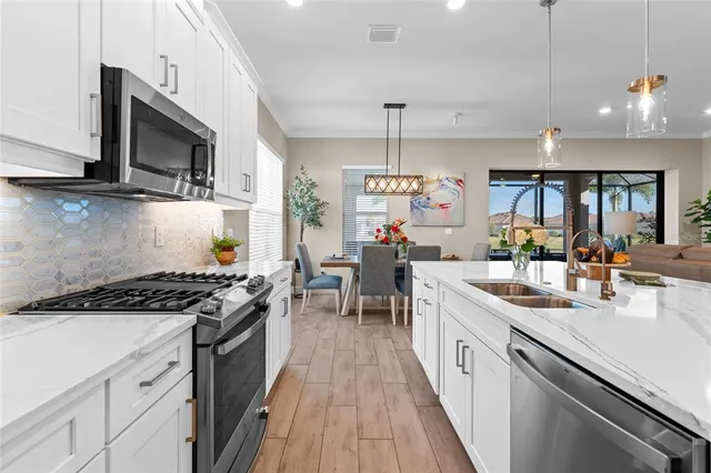 a hallway with furniture and wooden floor
